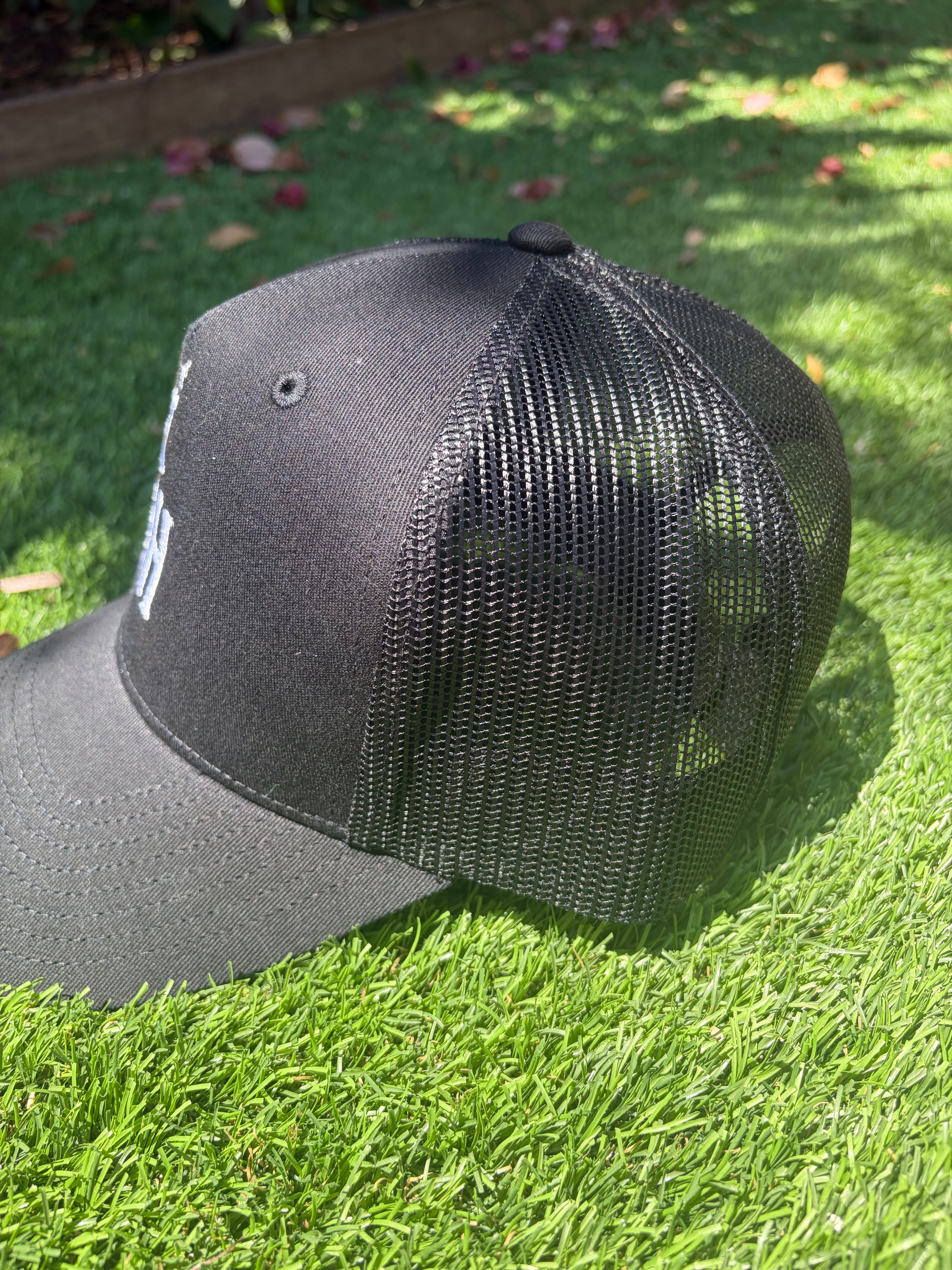 Last Habit Signature Trucker Hat